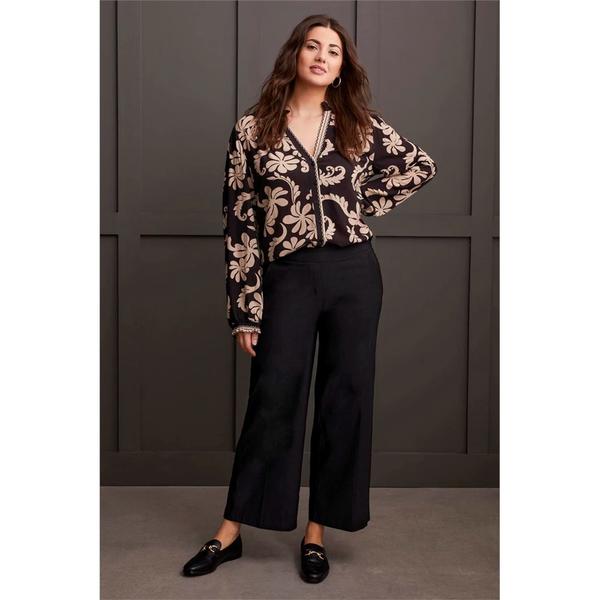 Pantalon aux chevilles amincissant